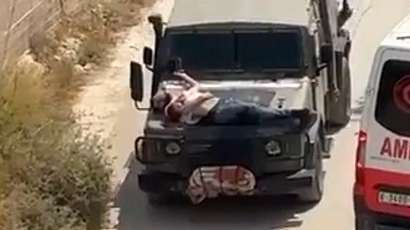 Israeli Army Straps Wounded Palestinian To Jeep | - X/Screengrab