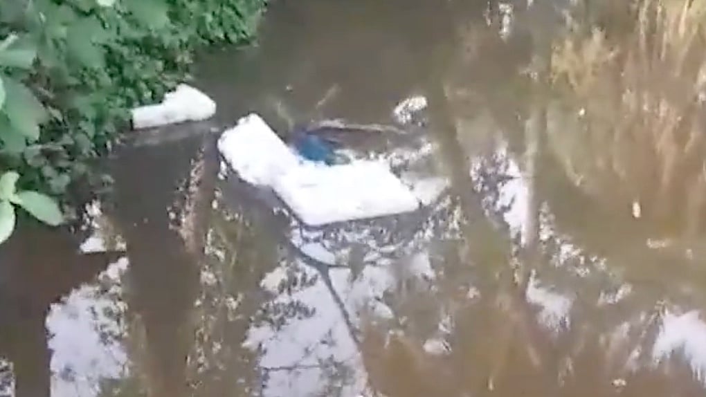 EVM Thrown Into Pond As Violence Breaks Out In West Bengal | - IANS Screengrab
