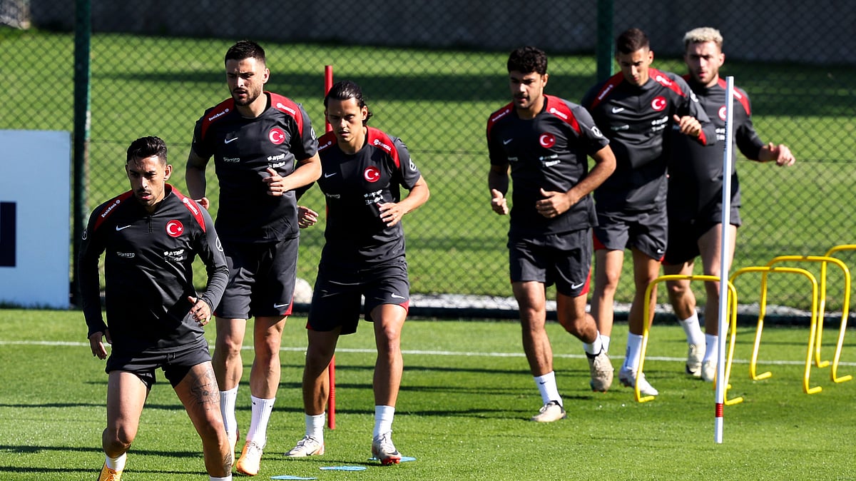 AP : Turkish players warm up during a training session ahead of the Euro 2024 soccer tournament, at Hasan Dogan sport complex, outside Istanbul, Turkey, Wednesday, May 29, 2024. Turkey will play friendly matches with Italy and Poland during its preparation before the Euro 2024.