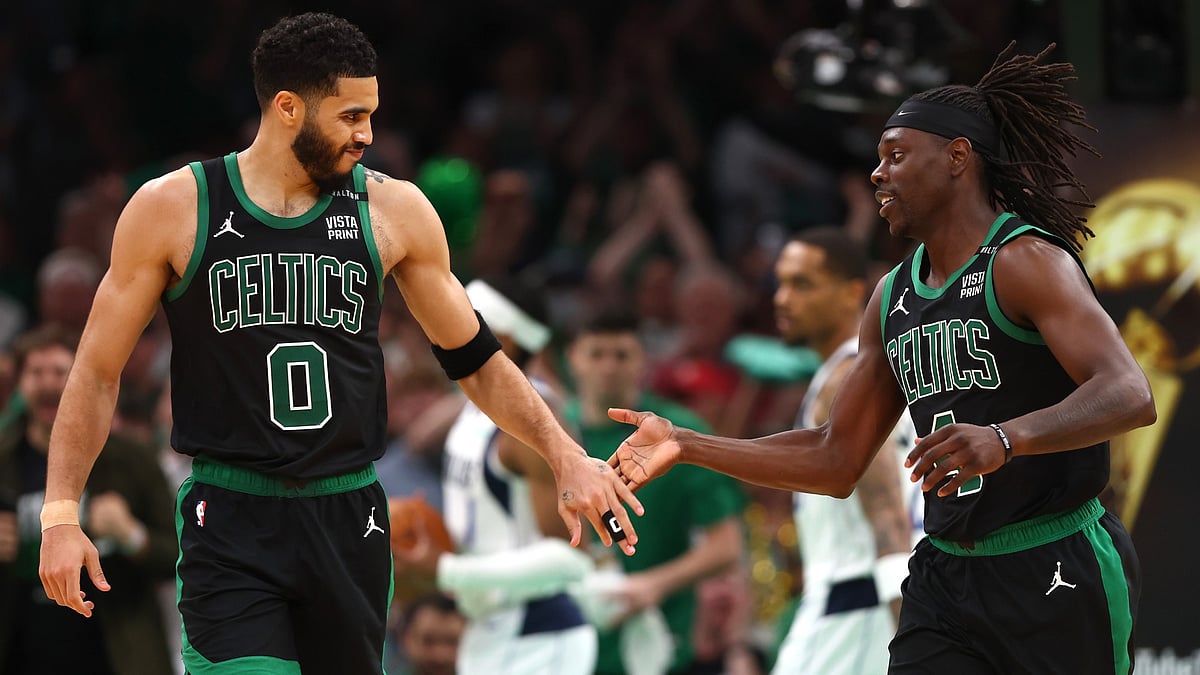 Jayson Tatum (left) and Jrue Holiday of the Boston Celtics celebrate during Game 2 of the 2024 NBA Finals.