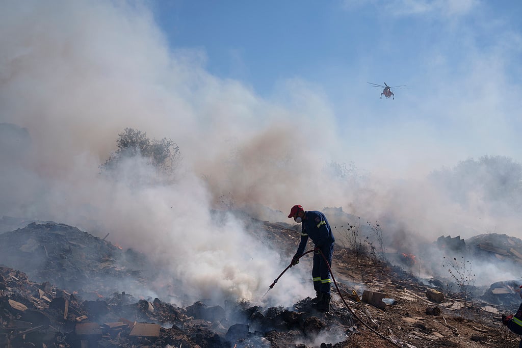 AP  : Greece Wildfires: Firefighters Report 'New Fires Every 10 Minutes' As Strong Winds Ignite Forest Fires