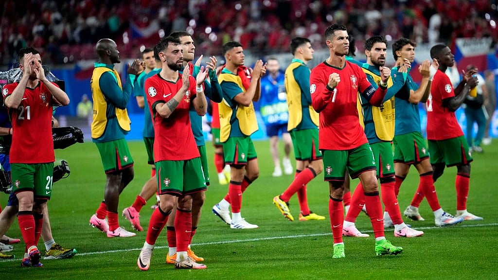 AP/Ebrahim Noroozi : Cristiano Ronaldo with teammates at the end of Group F match between Portugal and Czech Republic at the Euro 2024 tournament.