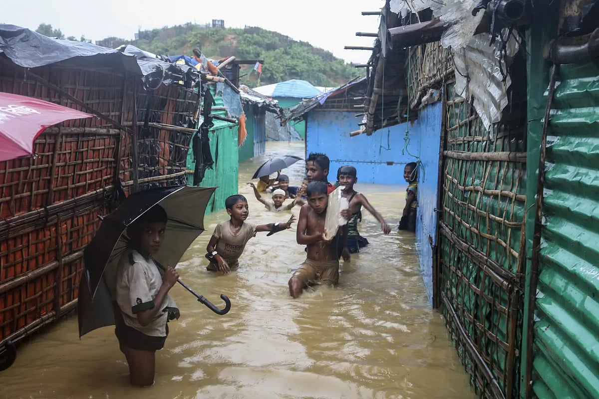 AP : Children play in deluged waters in Bangladesh |