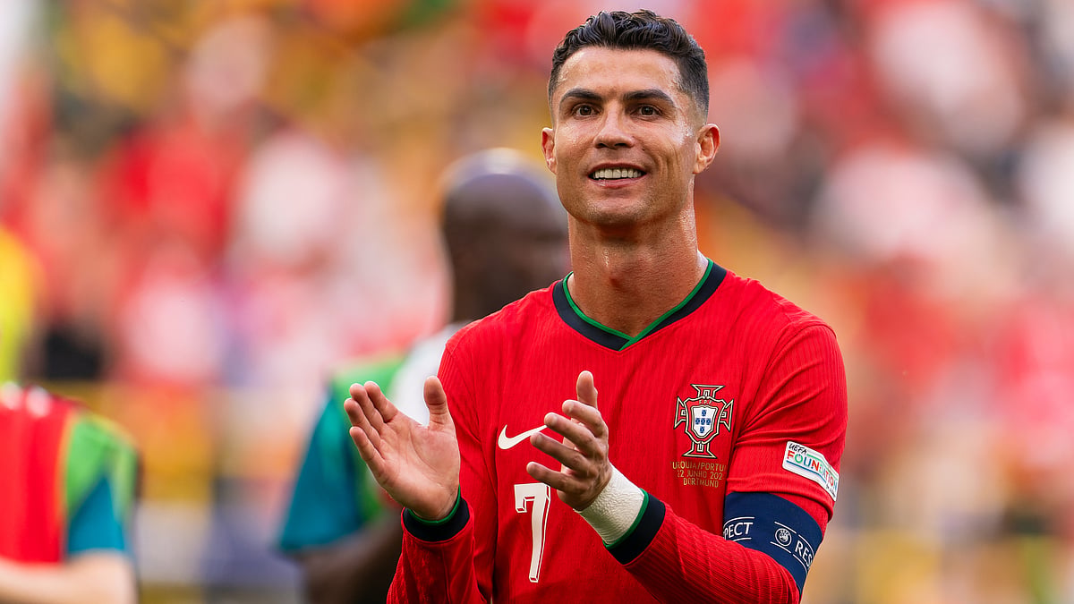 Cristiano Ronaldo applauds the fans after Portugal's win over Turkiye. - null