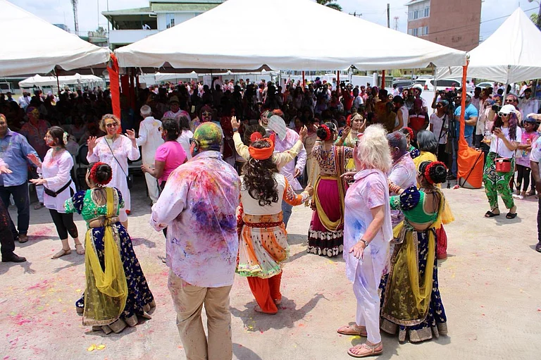 Indian Guyanese celebrating the festival of holi in Georgetown. - X | India in Guyana