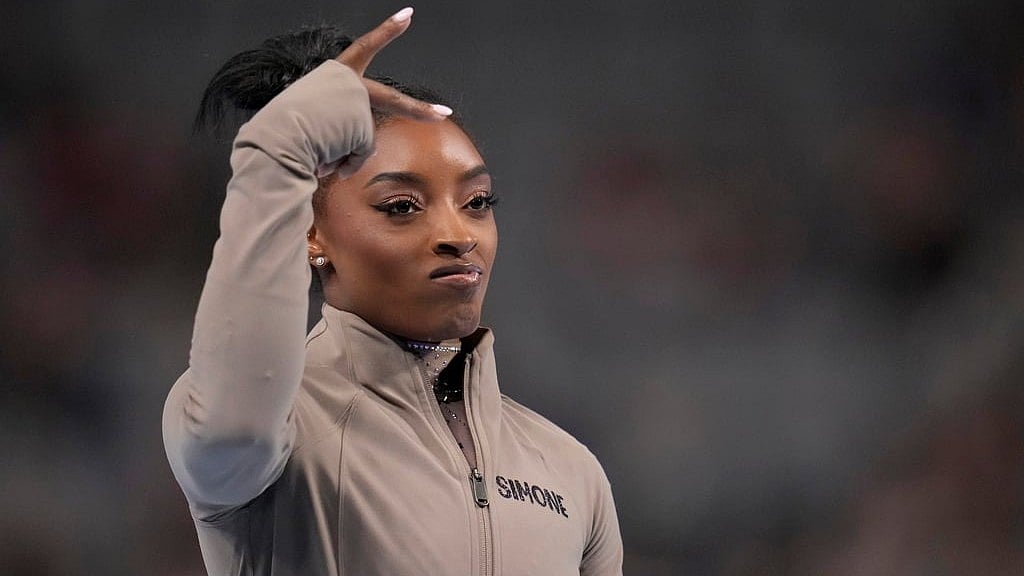 AP/Julio Cortez : Simone Biles.