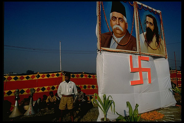 Swastika banner & portrait of Hindu nationalist Rashtriya Swayamsevak Sangh founder Keshav Baliram Hedgewar - Getty Images
