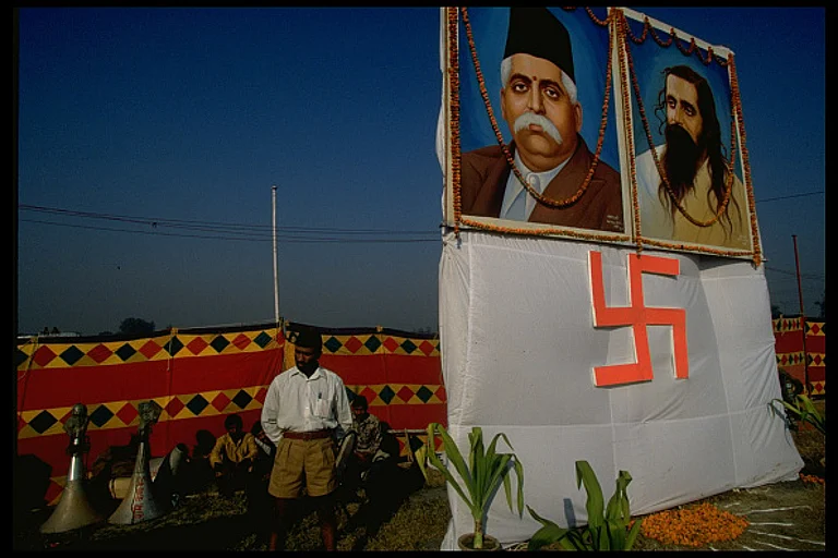 Swastika banner & portrait of Hindu nationalist Rashtriya Swayamsevak Sangh founder Keshav Baliram Hedgewar - Getty Images