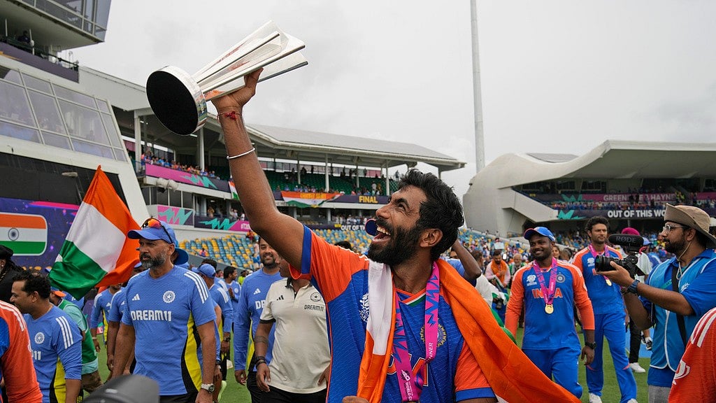 India's Jasprit Bumrah celebrates with the winners' trophy after India won the ICC Men's T20 World Cup final cricket match against South Africa at Kensington Oval in Bridgetown, Barbados, Saturday, June 29, 2024. - AP/Ramon Espinosa