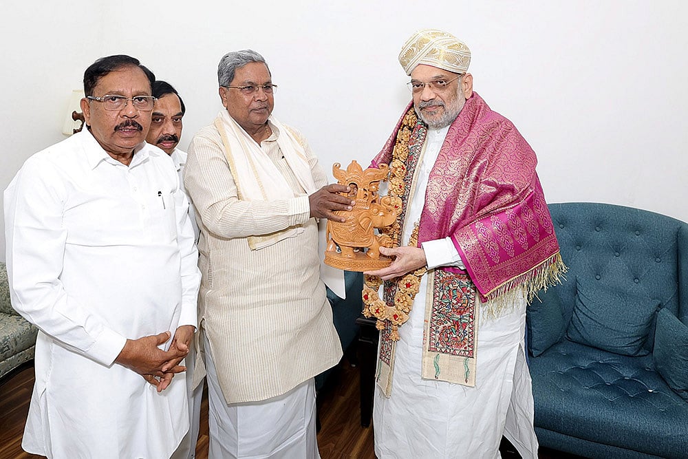 Siddaramaiah and G Parameshwara with Amit Shah