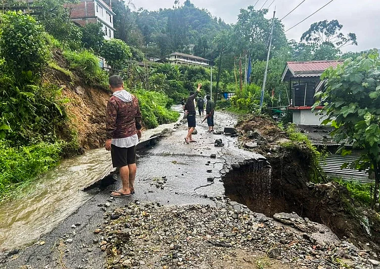 Section of a road damaged due to landslides triggered by incessant rainfall, at Mangan in North Sikkim, Thursday, June 13, 2024. - PTI