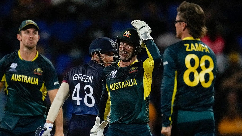 AP/Ricardo Mazalan : Adam Zampa (right) traps Zane Green LBW during the Australia vs Namibia, ICC T20 World Cup 2024 match in Antigua on Wednesday (June 12).
