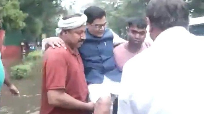Delhi Rains: Staff lifting Samajwadi Party MP Ram Gopal Yadav on their shoulders and carrying him to his vehicle | - ANI Screengrab