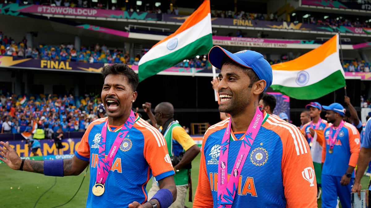 India's Hardik Pandya, left, and teammate Suryakumar Yadav celebrate after India won the ICC Men's T20 World Cup final cricket match against South Africa at Kensington Oval in Bridgetown, Barbados. - AP Photo/Ramon Espinosa