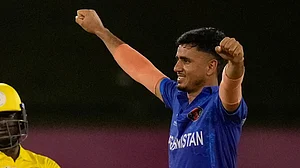 (AP Photo/Ramon Espinosa)
: Afghanistan's Mujeeb Ur Rahman, right, celebrates after his team beat Uganda for 125 runs during an ICC Men's T20 World Cup cricket match at Guyana National Stadium in Providence, Guyana, Monday, June 3, 2024.