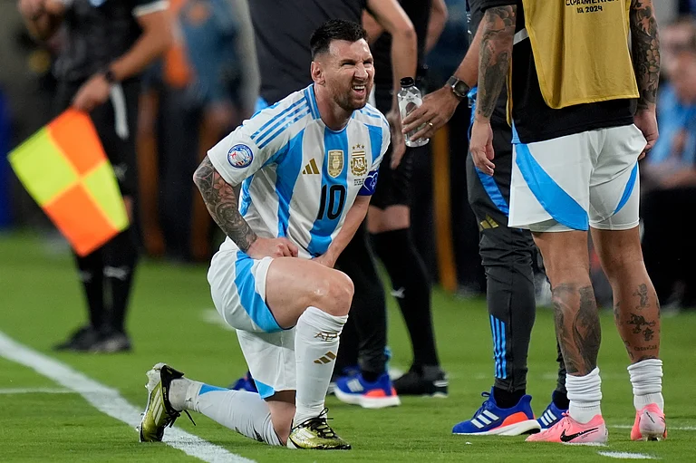 Argentina's Lionel Messi grimaces during a Copa America Group A soccer match against Chile in East Rutherford, N.J., Tuesday, June 25, 2024. - (AP Photo/Julia Nikhinson)