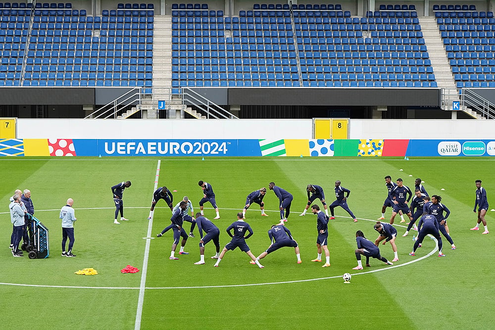 Photo: AP/Hassan Ammar : Euro 2024 Soccer France