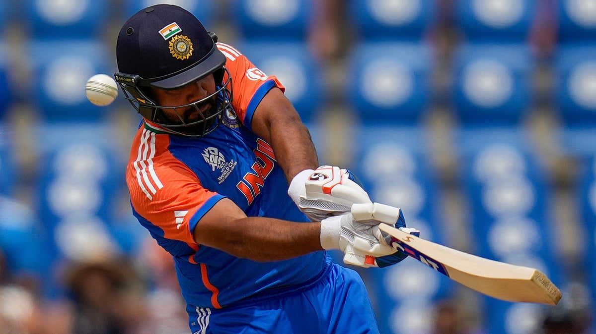 India's captain Rohit Sharma hits for six runs against Australia during an ICC Men's T20 World Cup cricket match at Darren Sammy National Cricket Stadium in Gros Islet, Saint Lucia, Monday, June 24, 2024. - AP Photo/Ramon Espinosa