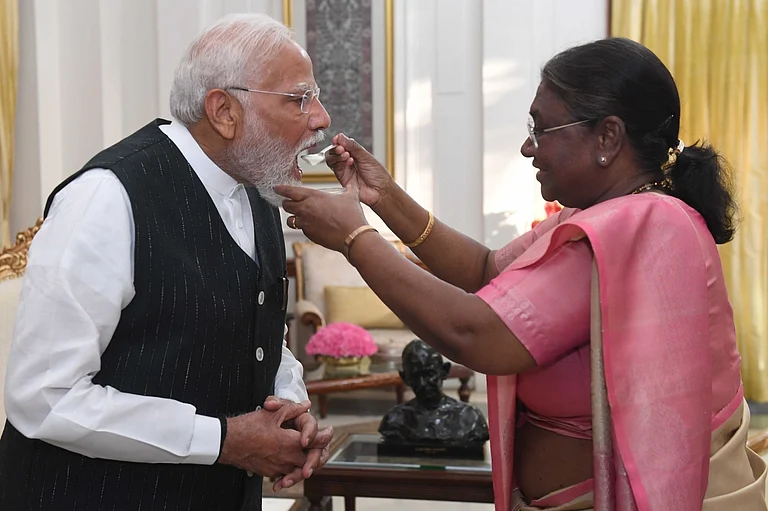 President Droupadi Murmu on Friday fed Modi 'dahi cheeni' (curd and sugar) which is considered auspicious in Indian tradition before undertaking important tasks or starting a new venture
- null