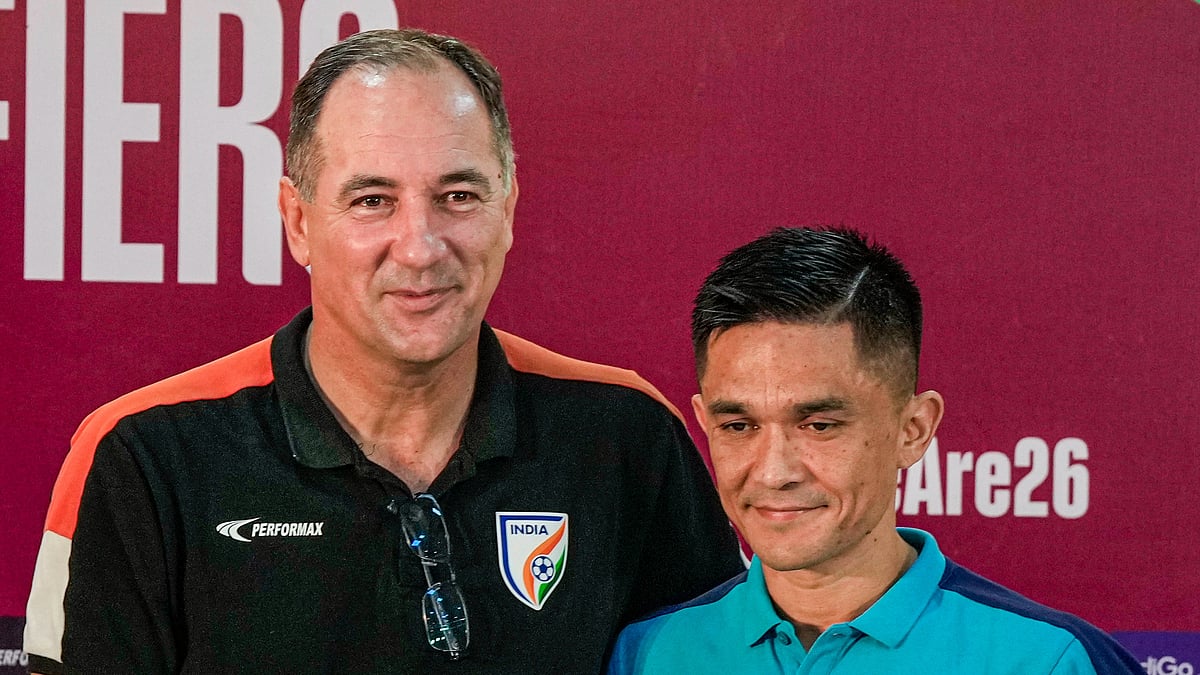 PTI Photo/Swapan Mahapatra : Indian national football team captain Sunil Chhetri and coach Igor Stimac pose for photos during an interaction with the media prior to the FIFA World Cup 2026 and AFC Asian Cup 2027 preliminary joint qualification round two match between India and Kuwait, at Vivekananda Yuba Bharati Krirangan (Salt Lake Stadium), in Kolkata.