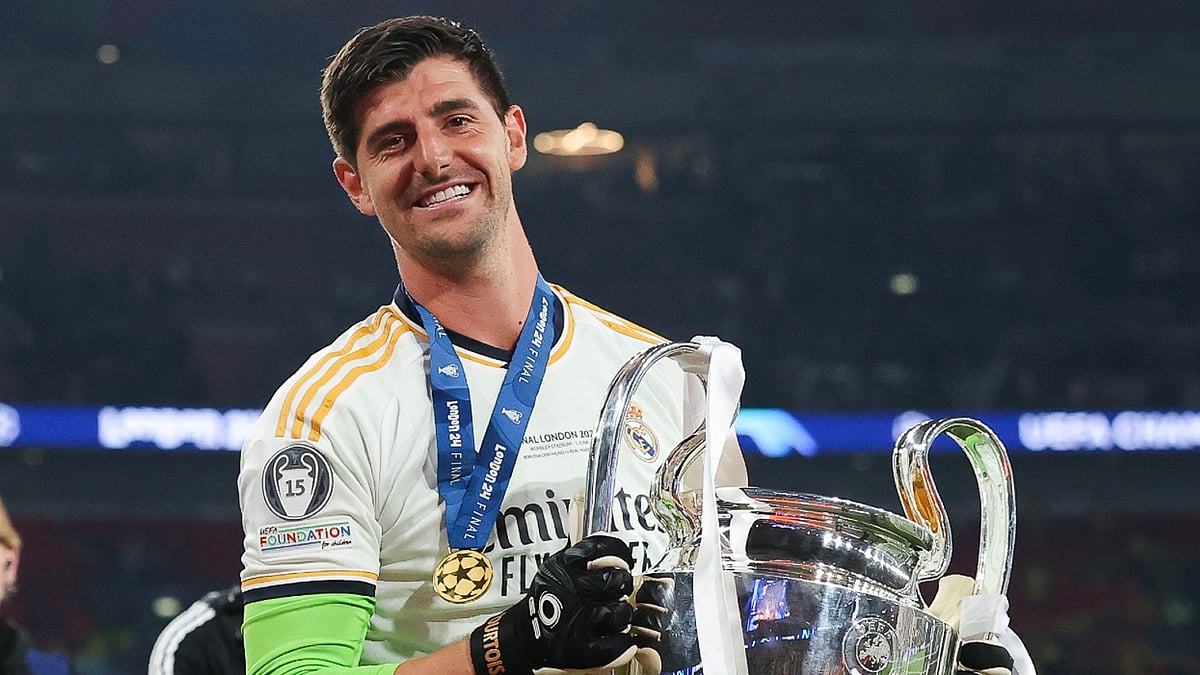 Thibaut Courtois with the Champions League trophy