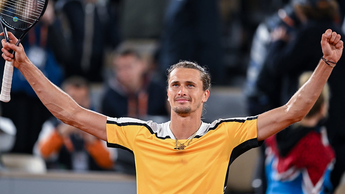 Alexander Zverev celebrates after converting match point