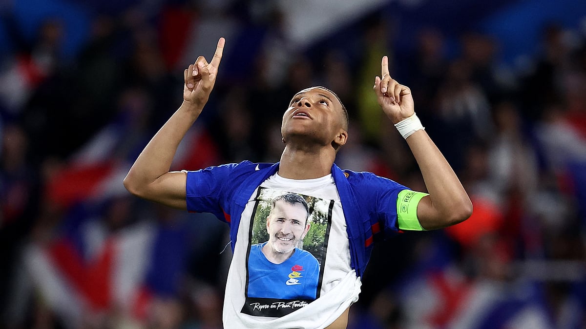 Kylian Mbappe celebrates his second-half goal against Luxembourg with a tribute.