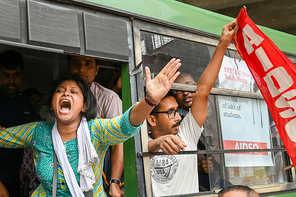 Photo: PTI : Protest against alleged irregularities in NEET result