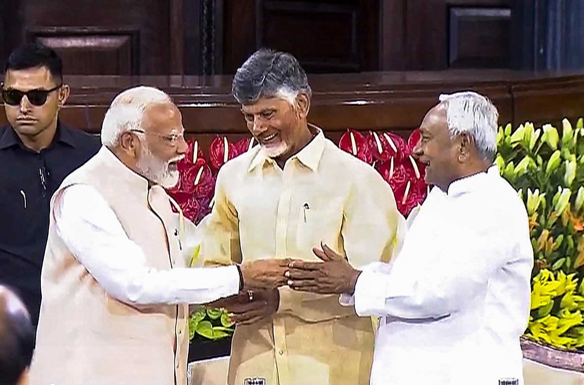 PM Modi with TDP's Chandrababu Naidu and JDU's Nitish Kumar  - PTI