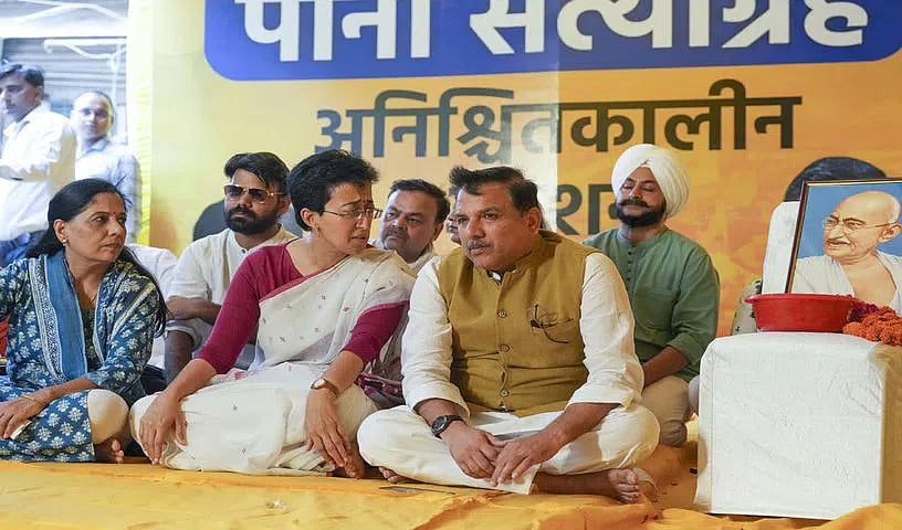 PTI : Delhi Water Minister Atishi with Sunita Kejriwal and AAP leader Sanjay Singh |