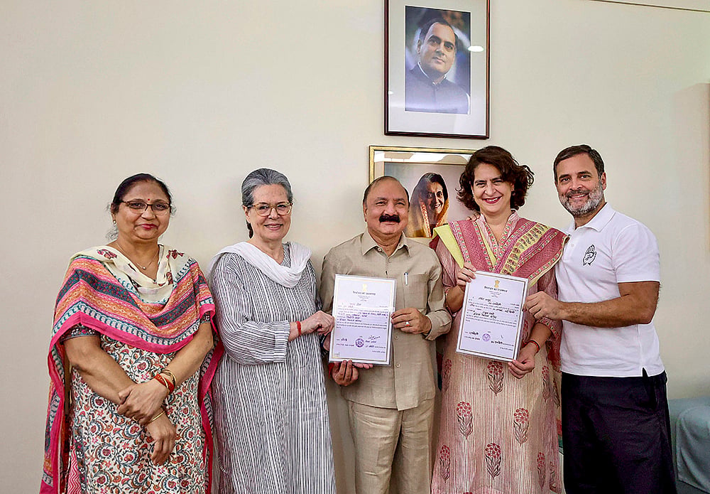 | Photo: PTI : Newly elected MPs Rahul Gandhi and Kishori Lal Sharma