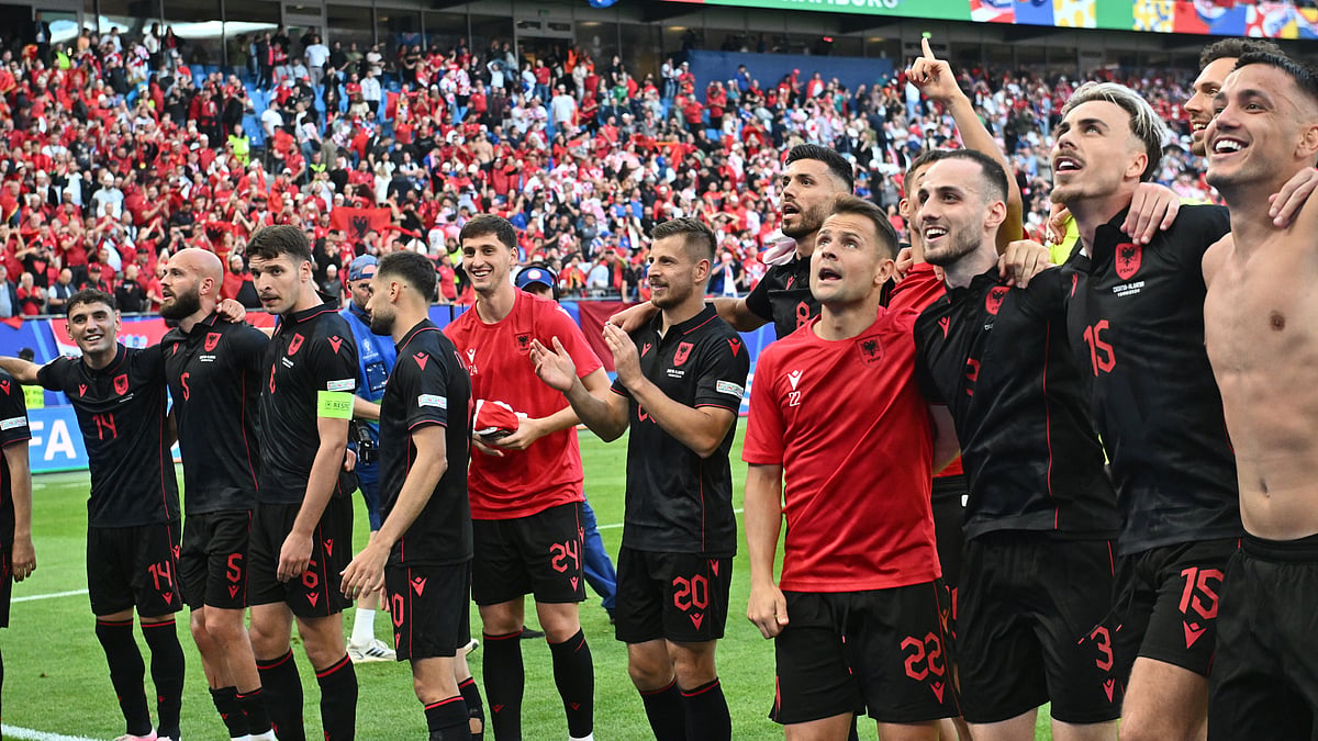 Albania's players celebrate after Klaus Gjasula's equaliser clinches a point against Croatia.