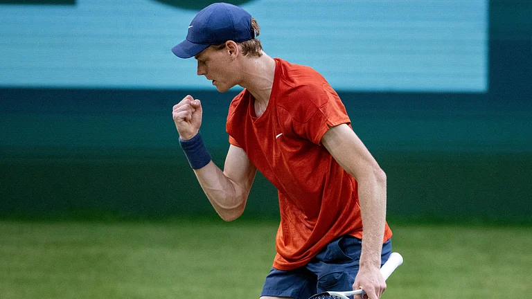 Jannik Sinner celebrates his semi-final win over Zhang Zhizhen - null