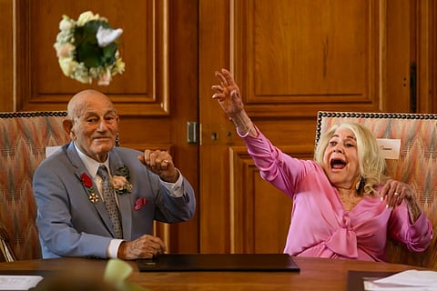 Harold Terens and 96-year-old Jeanne Swerlin during their marriage ceremony.