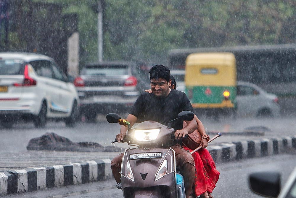 Photo: PTI : Weather: Rains in Delhi