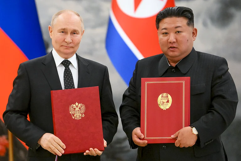 Russian President Vladimir Putin (L) and North Korean leader Kim Jong Un during the signing of their new treaty. - AP