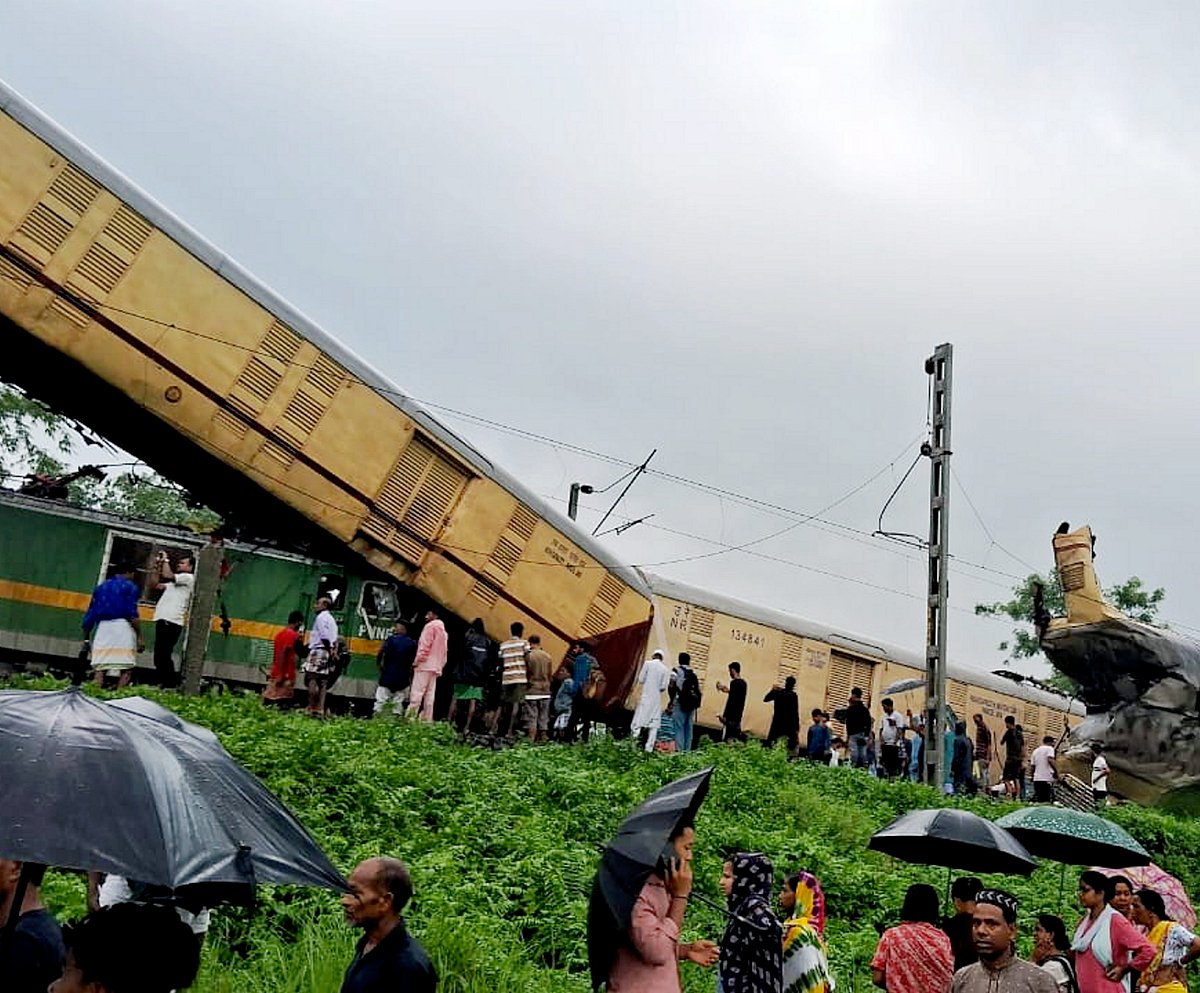 PTI : Locals gather after a collision between the Kanchanjungha Express and a goods train, near Rangapani railway station, on Monday, June 17, 2024