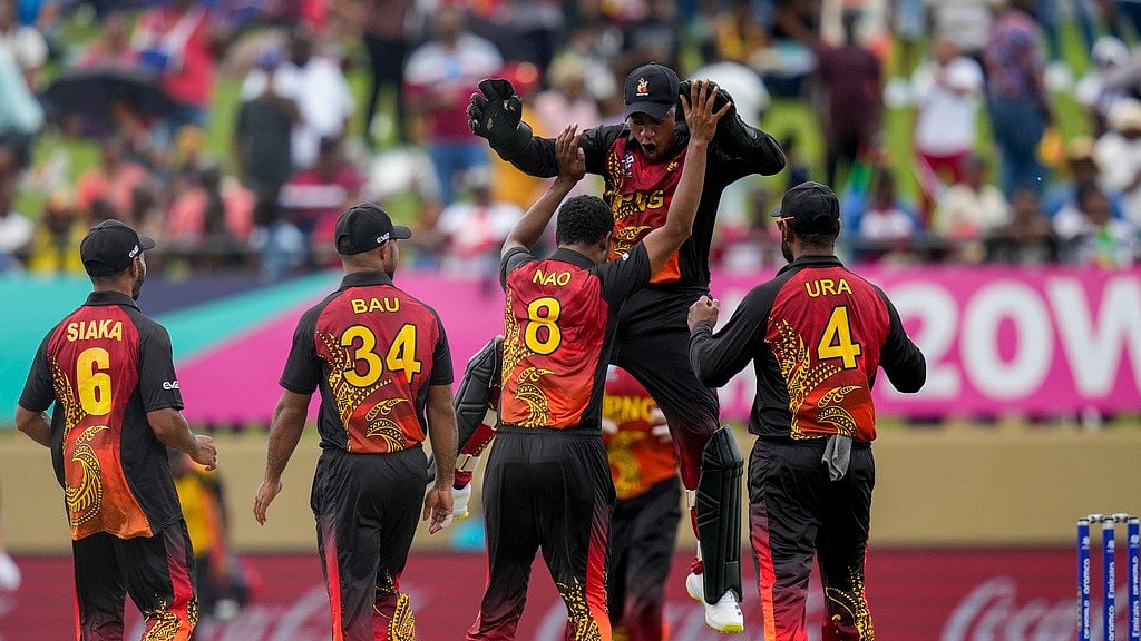AP/Ramon Espinosa : Papua New Guinea cricket team.