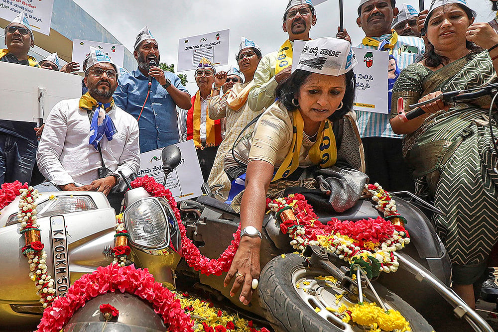 Aam Aadmi Party protest against the hike in fuel prices