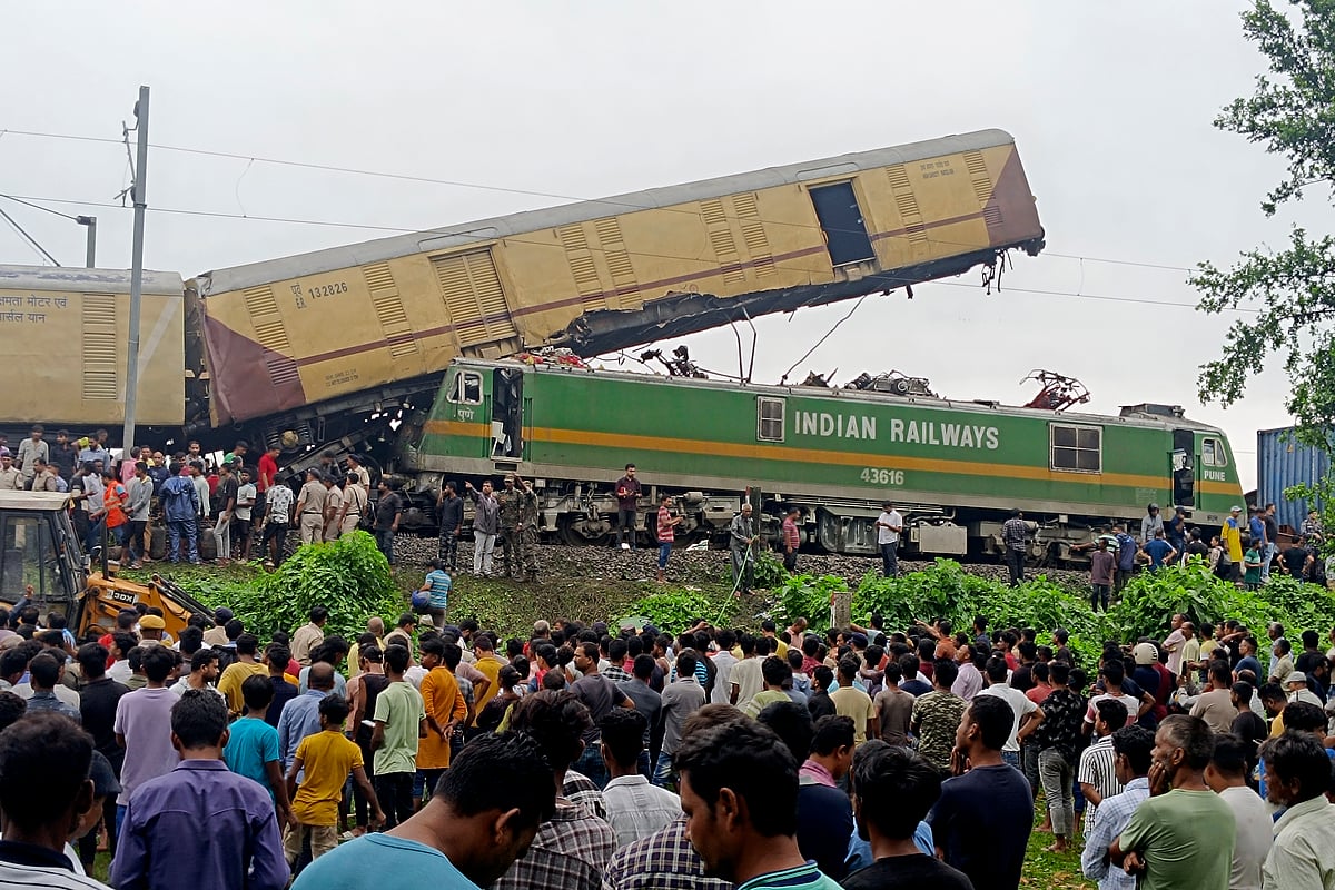 AP : Onlookers watch as rescuers work after a cargo train rammed into Kanchanjunga Express, a passenger train, near New Jalpaiguri station, West Bengal state, India, Monday, June 17, 2024