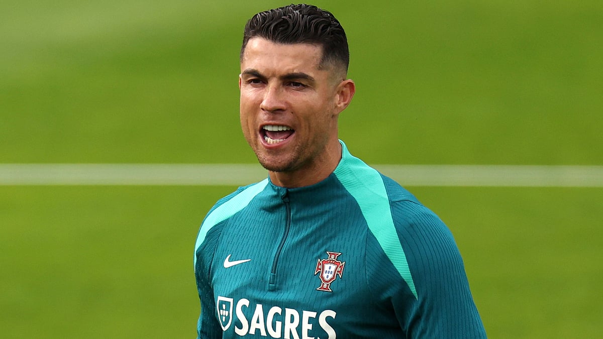 Cristiano Ronaldo will lead the line for Portugal on Tuesday. - null