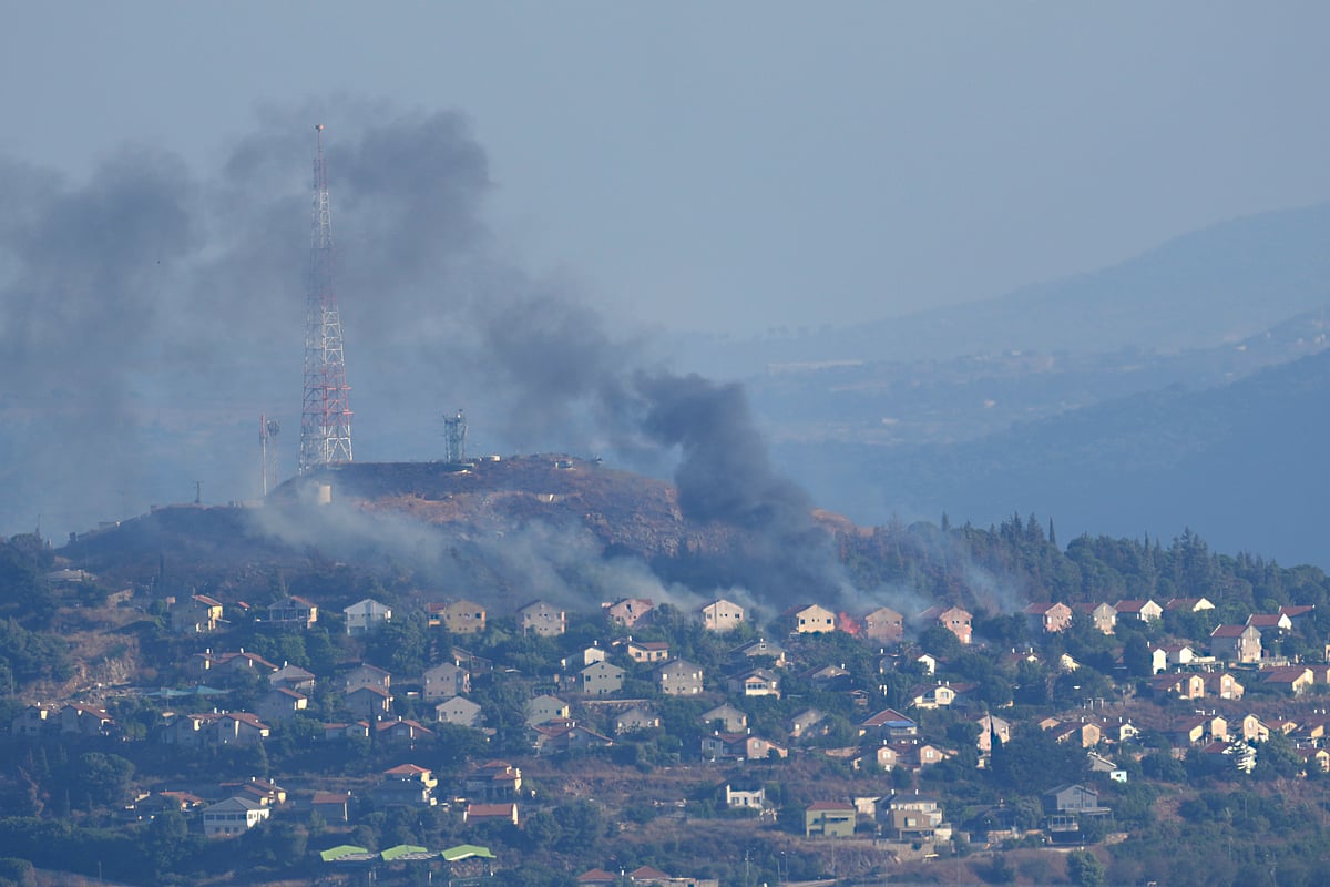 Firing from Hezbollah hits Israeli border down of Metula. |  - AP