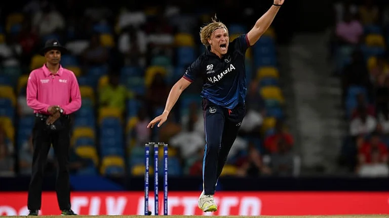 Ruben Trumpelmann celebrates a wicket during the Namibia vs Oman, T20 World Cup 2024 match in Barbados. - ICC