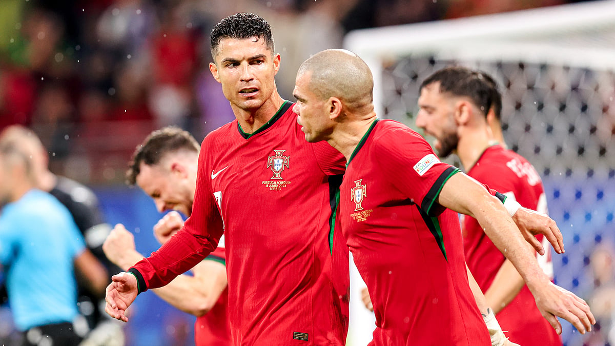 Veteran campaigners Pepe and Cristiano Ronaldo discuss after Francisco Conceicao's late winner for Portugal on Tuesday.