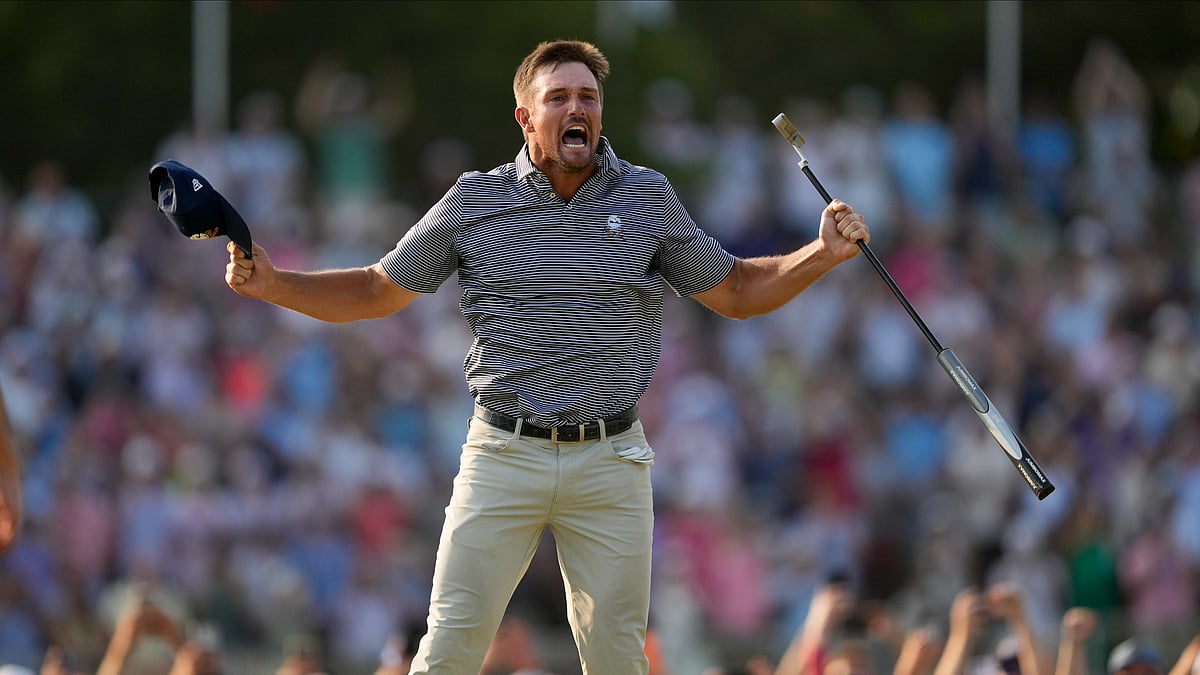 AP Photo/Matt York : Bryson DeChambeau celebrates after winning the U.S. Open golf tournament.