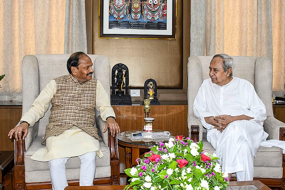Naveen Patnaik with Raghubar Das