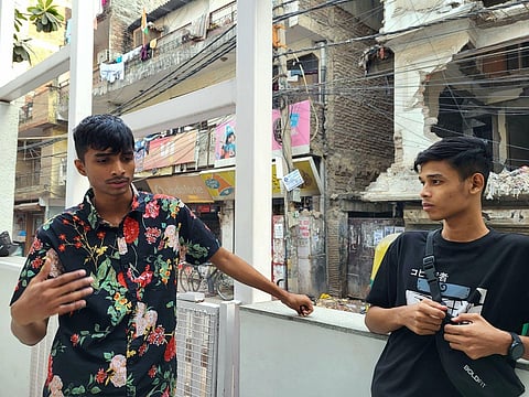 Shivam and Shivek (left to right) stand outside of Khoj Studios to discuss in detail their admiration for Jaun Eliya and the process of writing