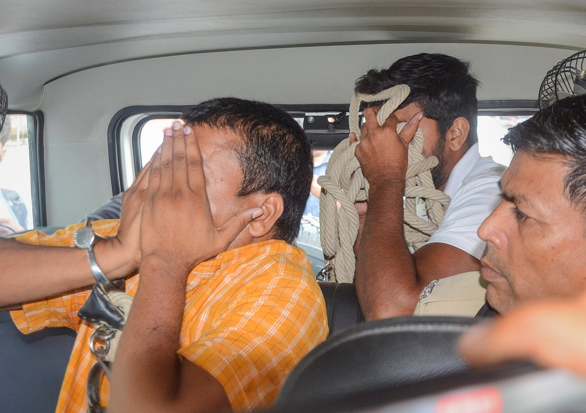 PTI : Accused in NEET-2024 case covering their faces |
