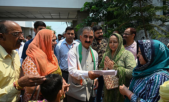 Chief Minister of Himachal Pradesh, Sukhvinder Singh Sukhu interacting with local people in Nadaun - Getty Images