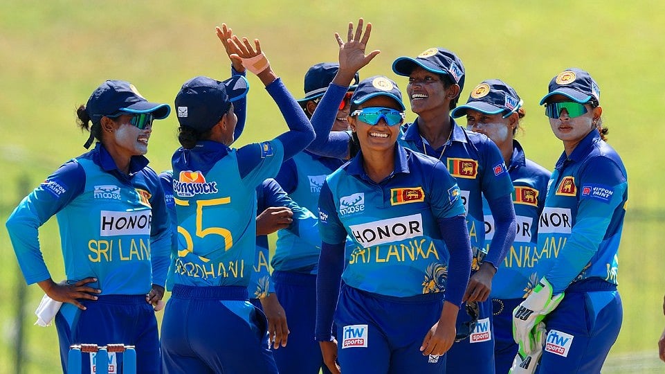 Photo: X/ @OfficialSLC : Sri Lankan women's cricket team celebrating a wicket against West Indies.